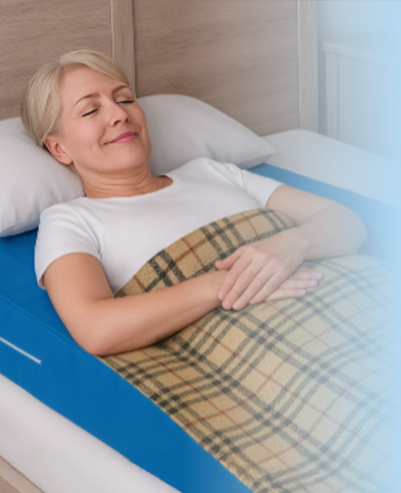 Woman sleeping comfortably on Restore You Therapeutic Support in Maximally Loose Packed Position for shoulder surgery recovery