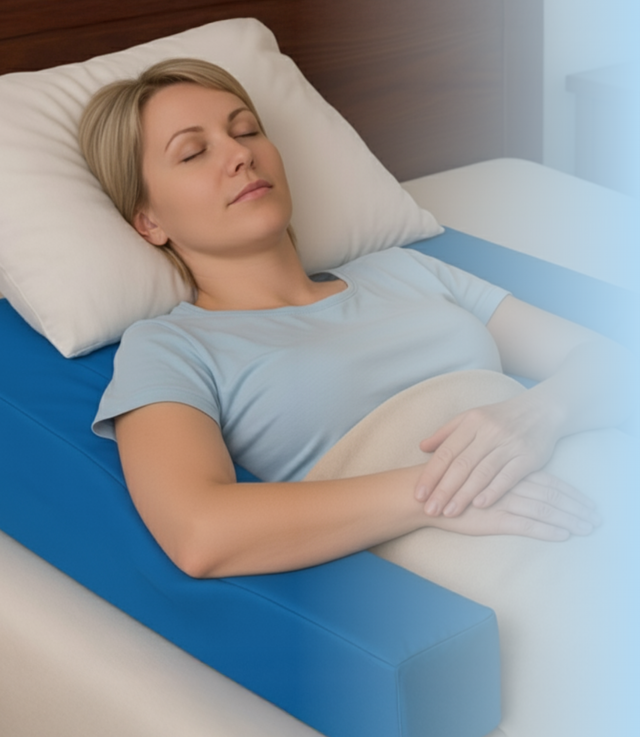 Woman resting comfortably on Restore You pillow for bad shoulder with arms elevated in therapeutic position for shoulder pain relief and recovery