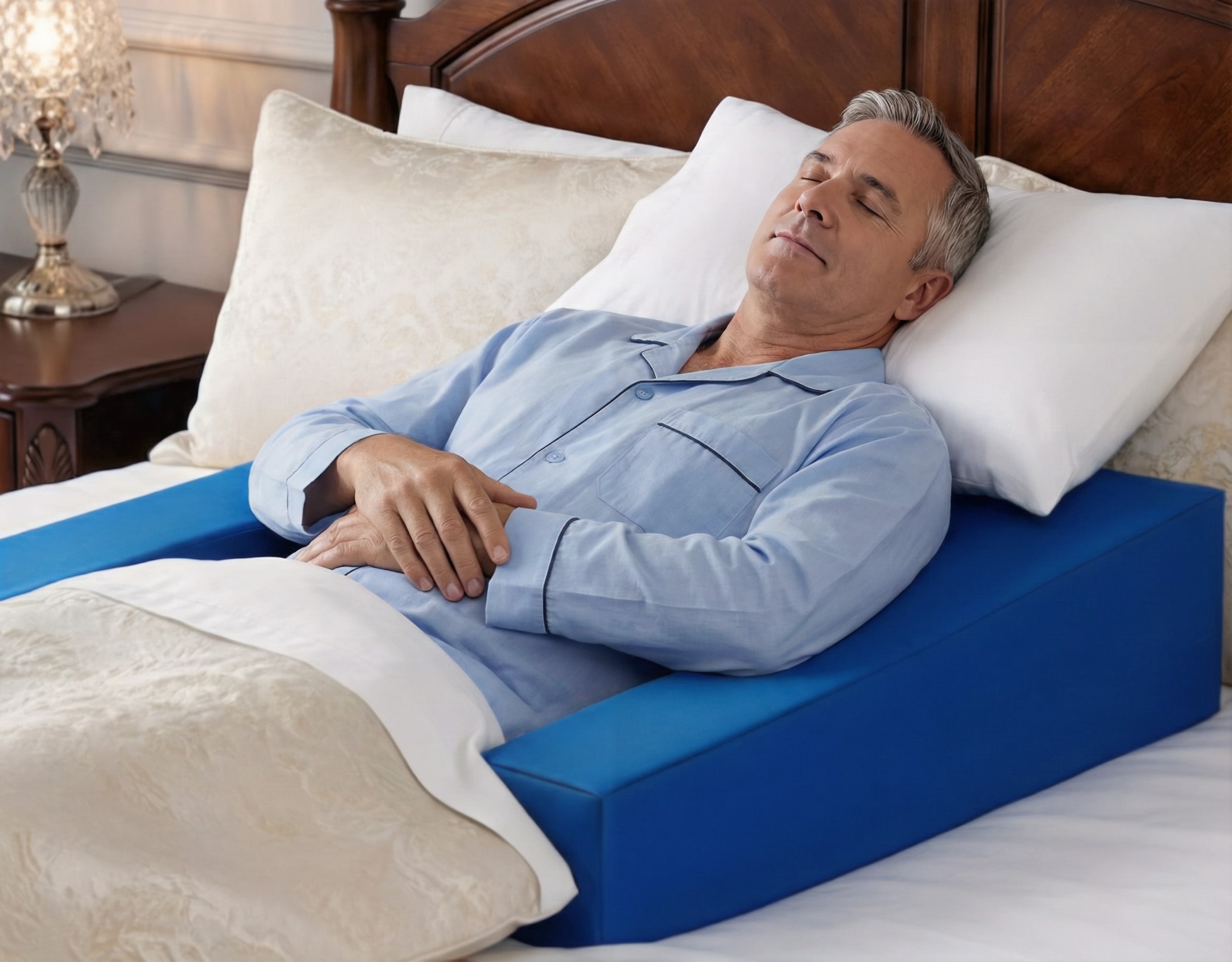 Man peacefully sleeping on Restore You sleep restoration pillow in her own comfortable bedroom - showing the therapeutic support and restorative sleep patients experience with FDA-registered recovery pillow