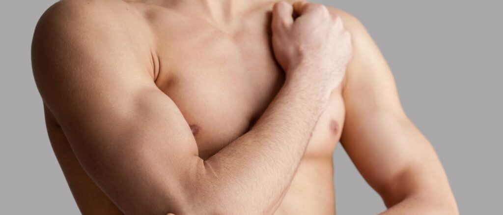 Patient protecting biceps muscle during Biceps Surgery Recovery after tenodesis procedure showing proper arm positioning and support techniques