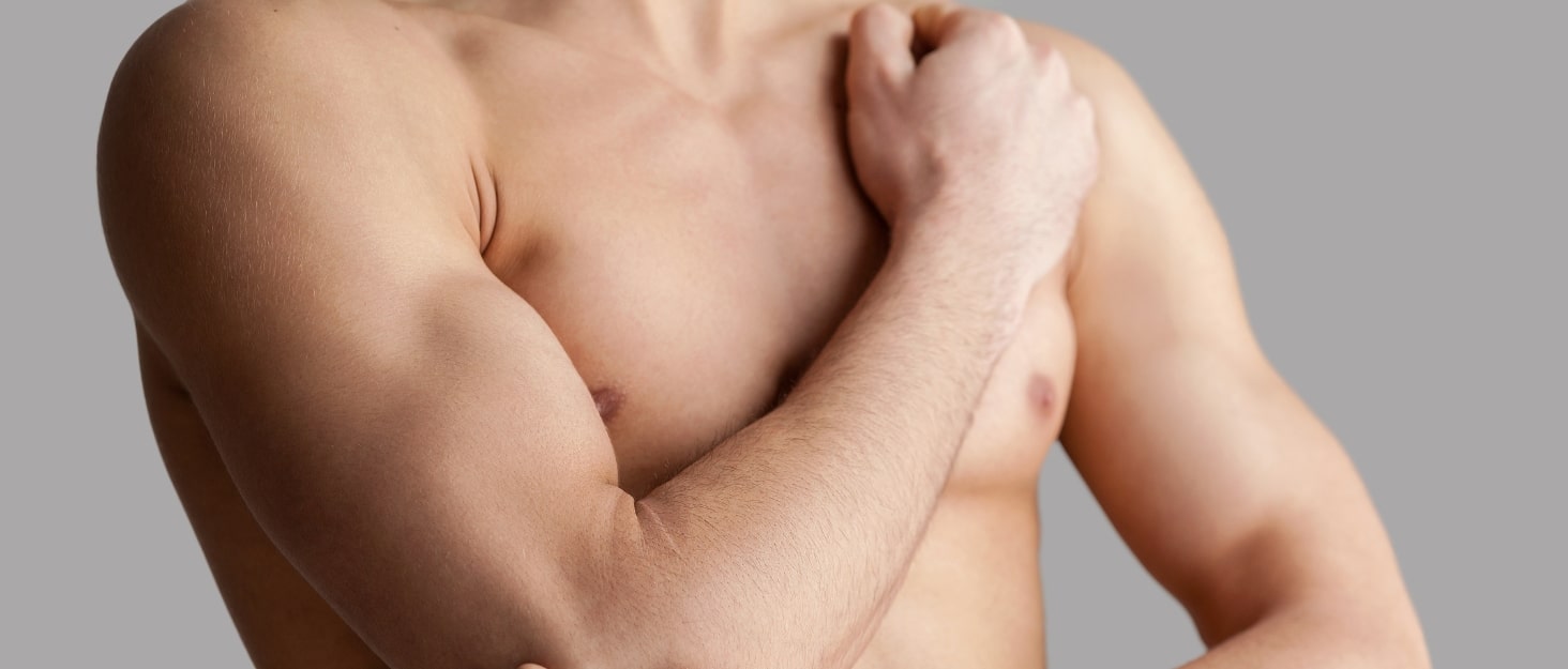 Patient protecting biceps muscle during Biceps Surgery Recovery after tenodesis procedure showing proper arm positioning and support techniques